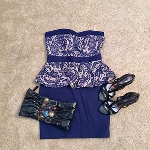 Strapless peplum dress with lace overlay. Very flattering on.